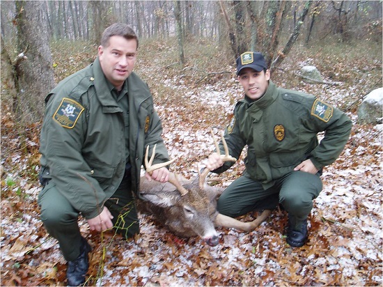 EnCon Police Officers with a deer