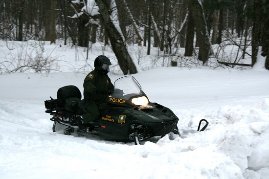 EnCon Officer on snowmobile