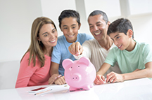 Happy family with piggy bank