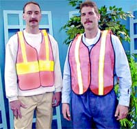 Two men post safety vest