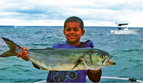 Image of Boy with Bluefish