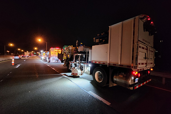 sights and sound - night time work zone trucks