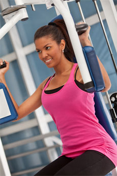 Woman at Gym Exercising