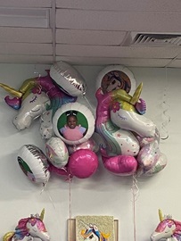 Photo of the unicorn balloons at Alivia's adoption