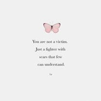 Photo of text that reads "You are not a victim.  Just a fighter with scars that few can understand."