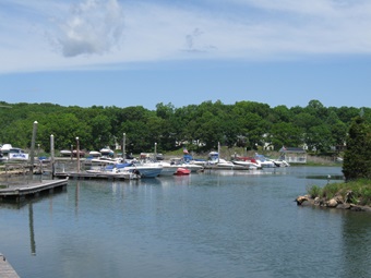 Photo of a small marina with boats at slips