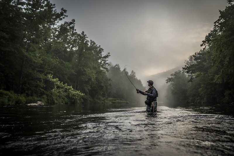 Fly casting into the fog on the wild and scenic Farmington River. 