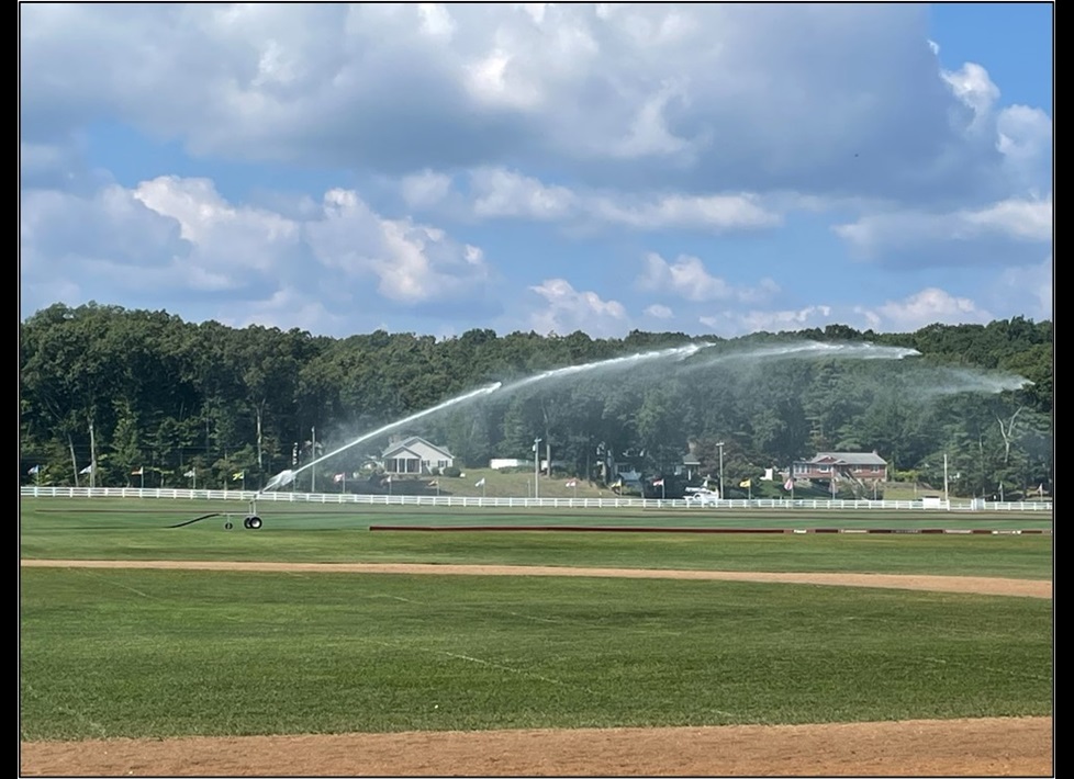 Irrigation of a turf field with a water cannon