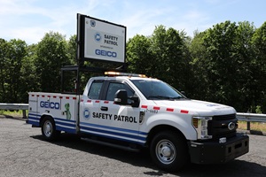 Picture of a white and blue pick up truck with sign stating Geico Safety patrol. The  CT DOT logo, Geico logo and Geico Gecko are visible on the side of the truck.
