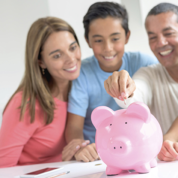 Family with Piggy Bank