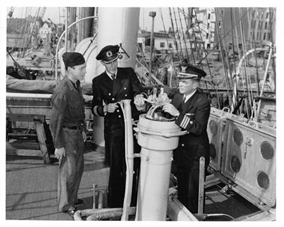 Cmdr. Gordon McGowan, right, the first captain of the Eagle.