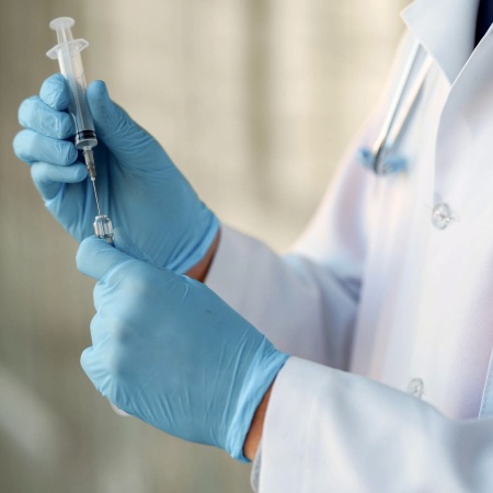 Doctor administering a shot