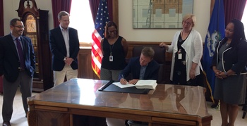 Governor Lamont signing the state budget