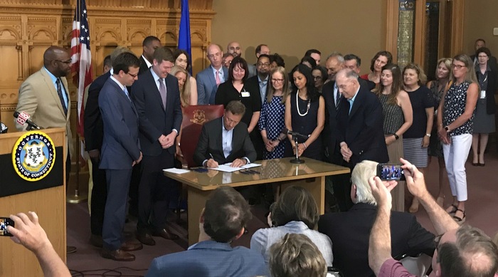Governor Lamont signing the Mental Health Parity Act