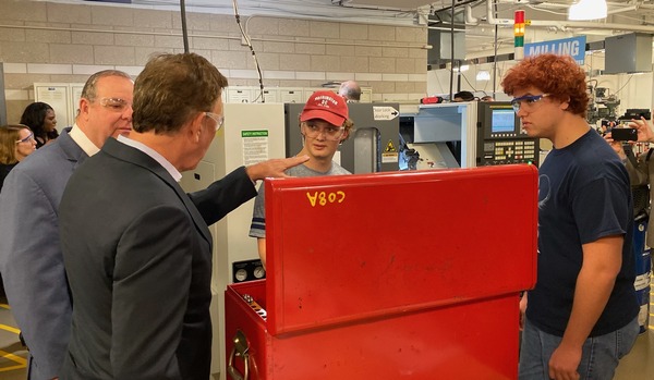 Governor Ned Lamont speaks with students at the advanced manufacturing technology center at Naugatuck Valley Community College in Waterbury.