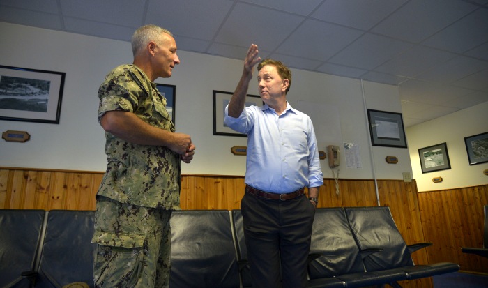GUANTANAMO BAY, Cuba (Dec. 27, 2019) Rear Adm. Timothy Kuehhas, Joint Task Force commander at Naval Station Guantanamo Bay (NSGB), left, speaks with Governor Ned Lamont. NSGB is the forward, ready, and irreplaceable sea power platform in the Caribbean, and has supported the Navy's most advanced ships for more than a century. (Credit: U.S. Navy photo by Mass Communication Specialist 2nd Class Kevin J. Steinberg/RELEASED)