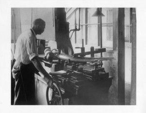 Cheney Employee Cutting Tusks, 1900