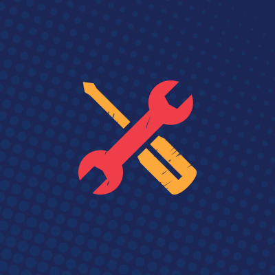 yellow screwdriver and red wrench on blue background