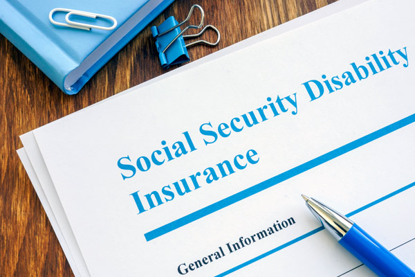 Social Security Disability  Insurance application and pen