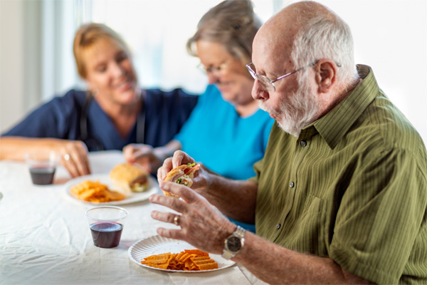 Older people eating a meal
