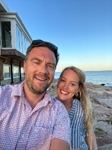 Rebecca and Andrew take a selfie on the beach