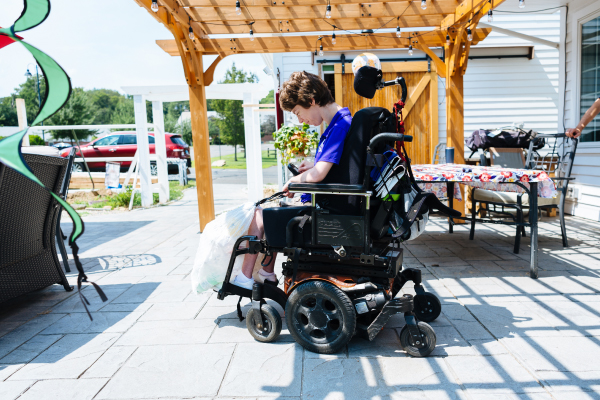 Person using wheelchair in home 