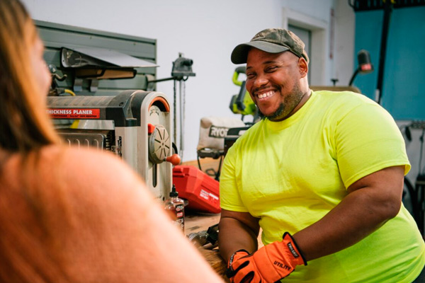 two individuals talking at work