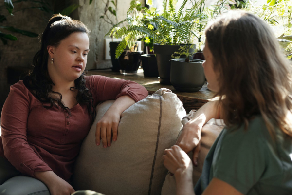 Two Women talking about quality of life