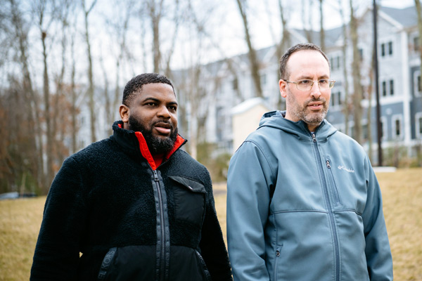 individual with intellectual disability walking with advocate