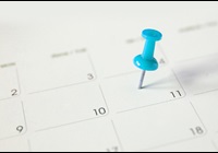 thumbtack on calendar