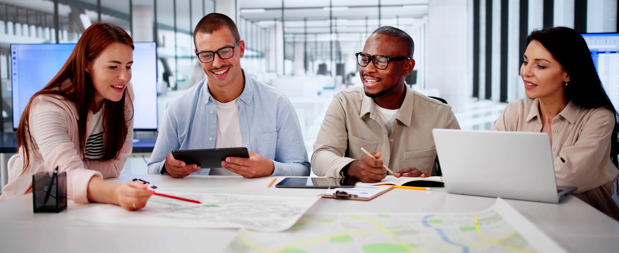 Project team reviewing plans stock photo