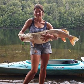 woman holding record pike