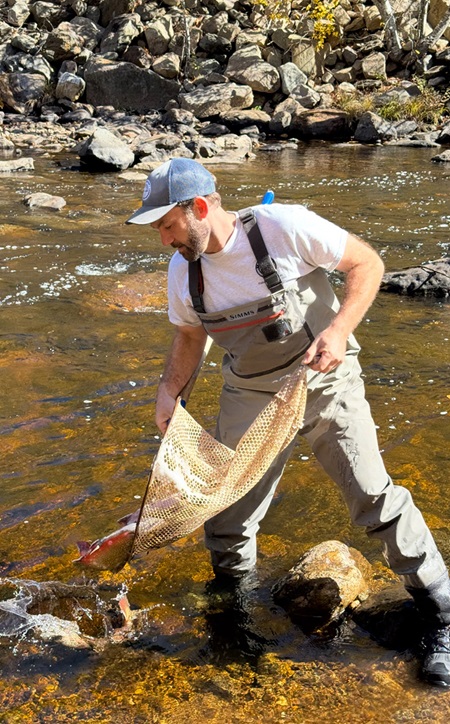 DEEP staff stocking fish