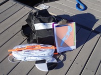 A secchi kit on a dock.