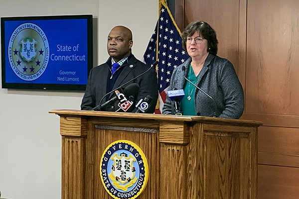 Commissioner Higgins at a press conference.