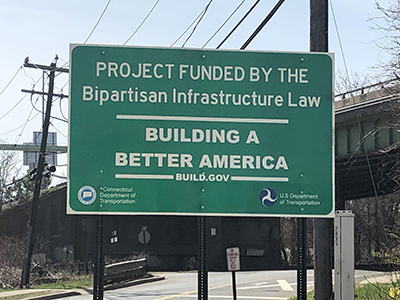 Project Funding Street Sign - Funded by the Bipartisan Infrastructure Law - Building a Better America