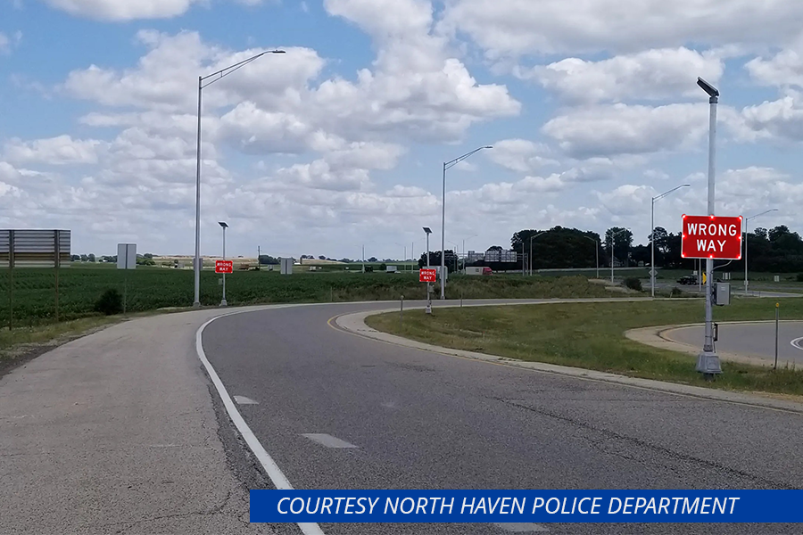 installation of new wrong way detection technology with photo credits in a blue box lower right saying "Courtesy of North Haven Police Department"