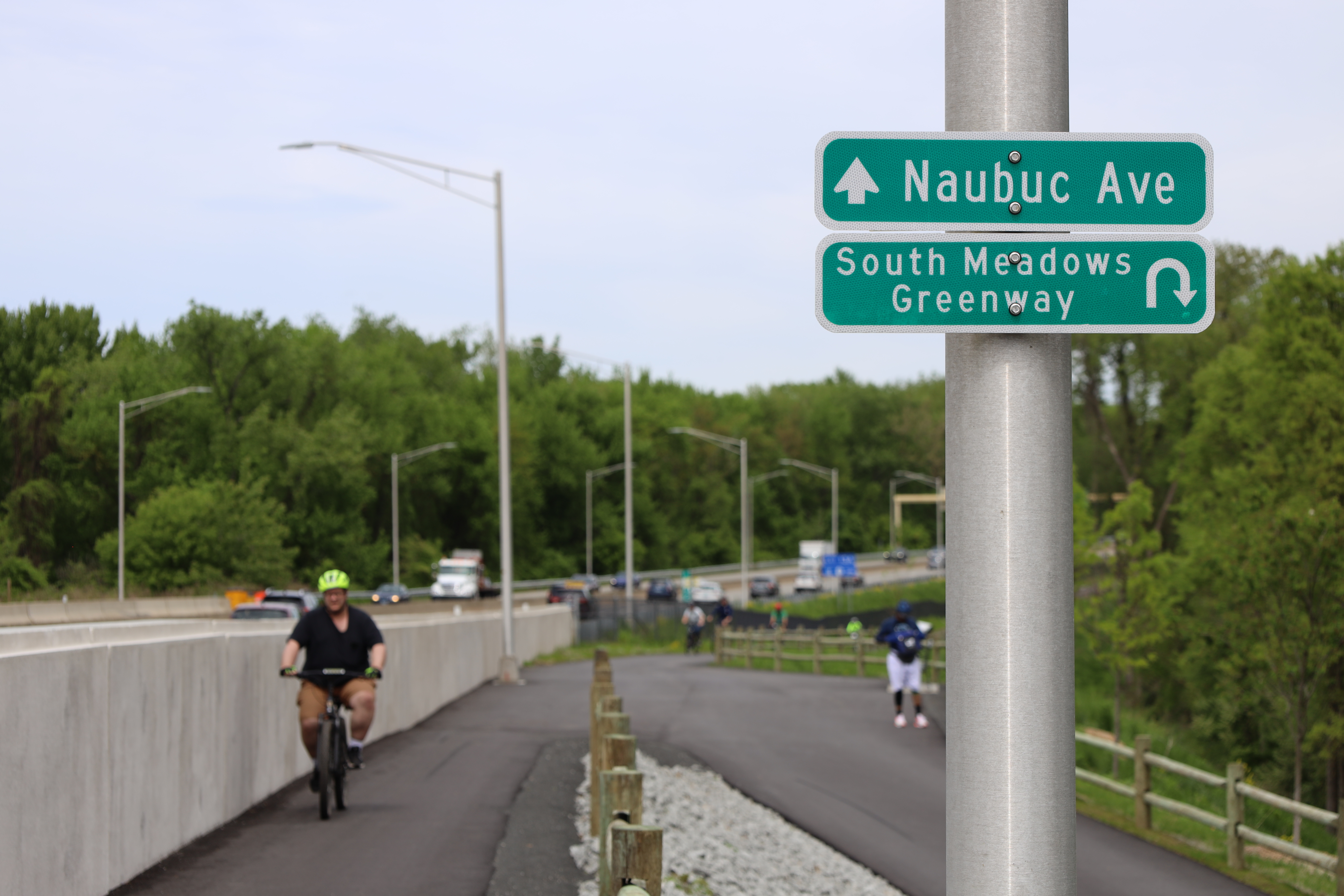 Bicyclist riding on the putnam bridge trail from glastonbury to wethersfield