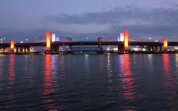 Q Bridge lit red, white and blue
