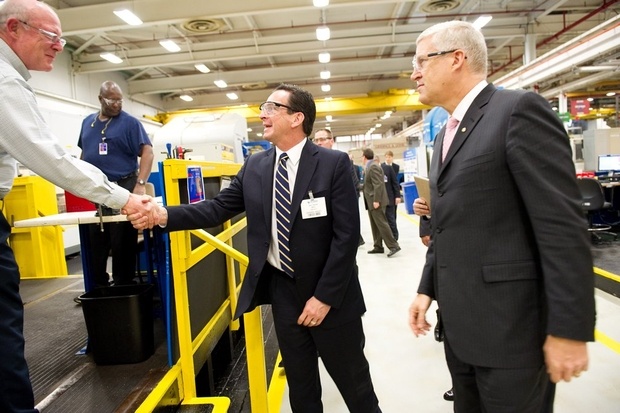 United Technologies Corporation Chairman and CEO Louis R. Chenevert takes Governor Malloy on a tour of the Pratt & Whitney Engine Center in Middletown. (April 5, 2011)