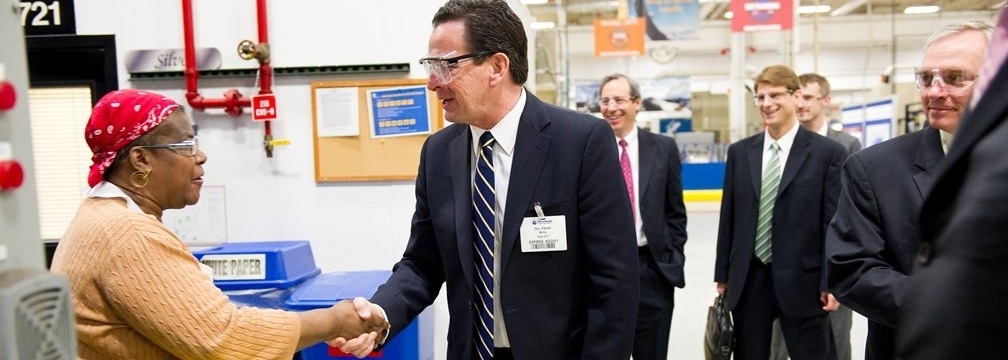 Governor Malloy greeting workers at a factory