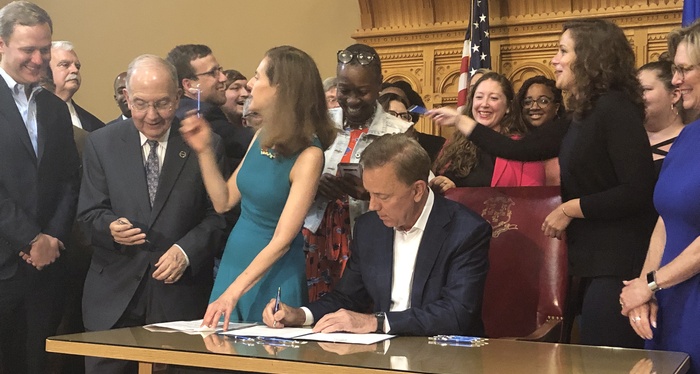 Governor Lamont signing FMLA bill