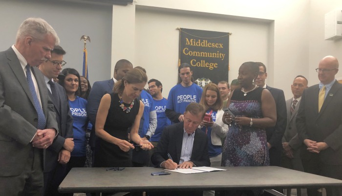 Governor Lamont signing bill