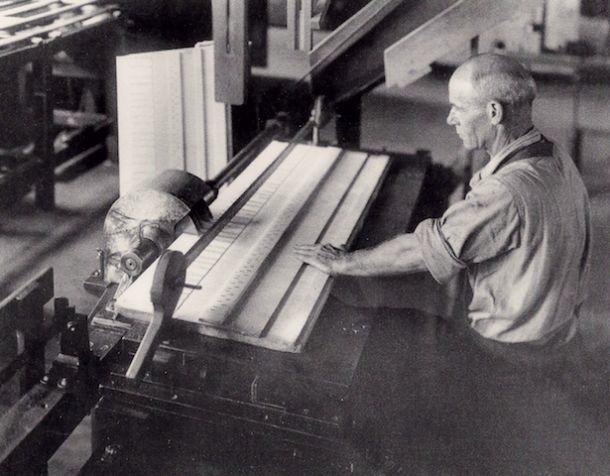 Worker cutting ivory