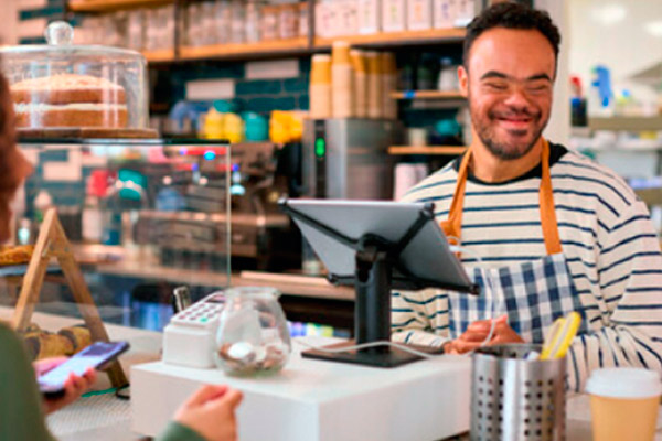 Man works as cashier