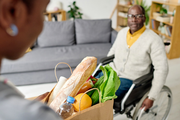 Older man gets food delivered