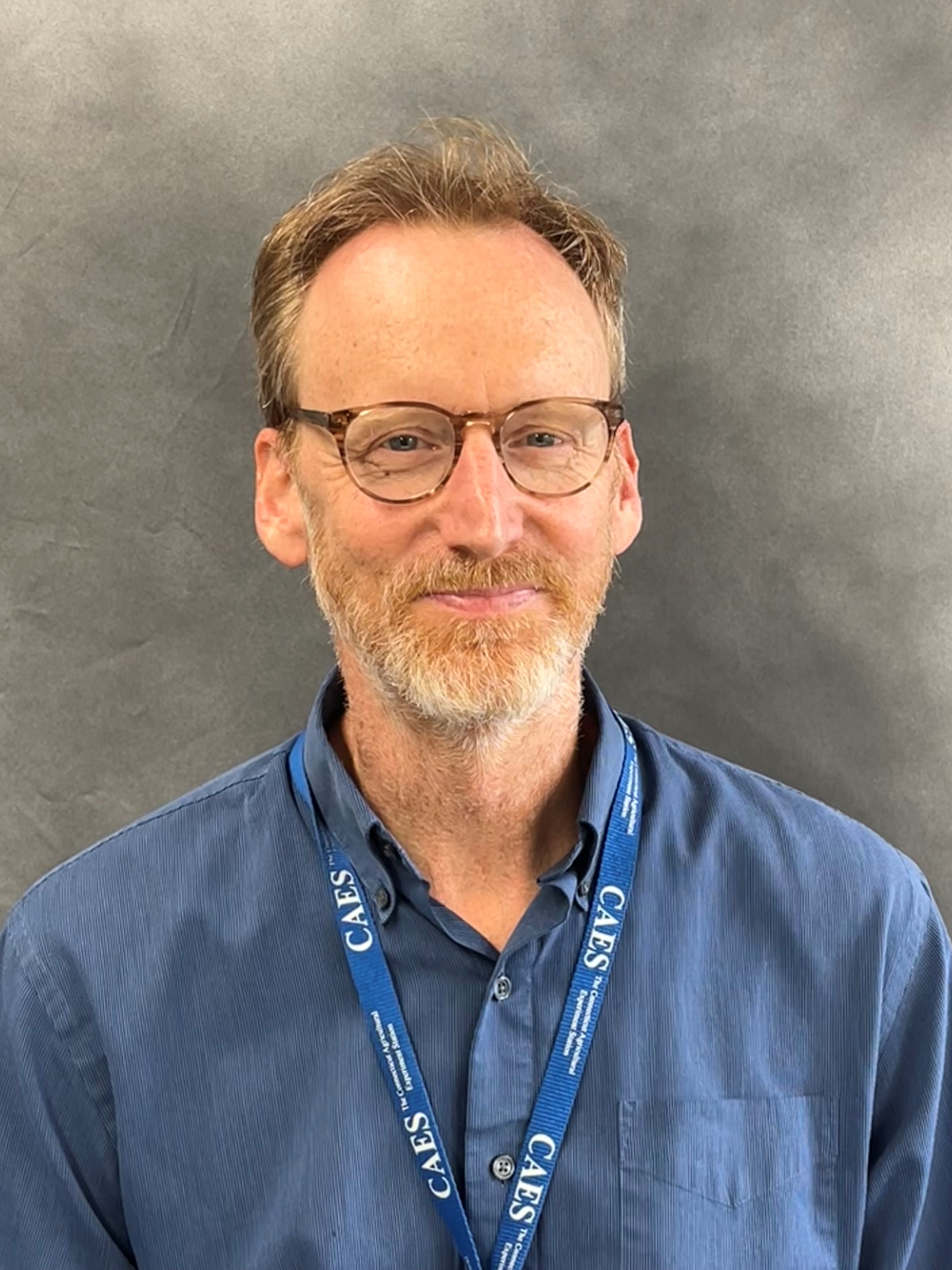 A photograph of Dr. Phil Armstrong, head of the Department of Entomology at the Connecticut Agricultural Experiment Station.