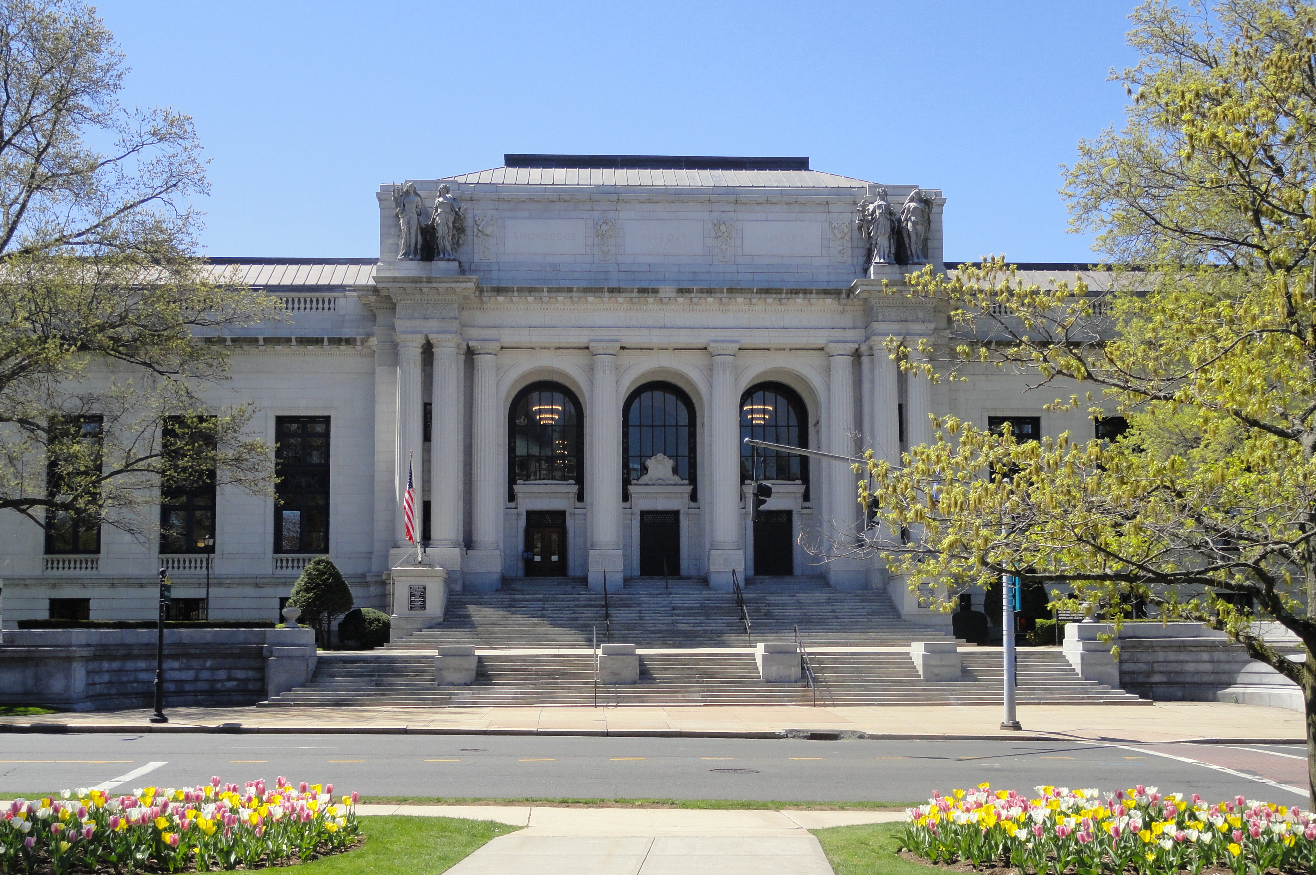The front of the Connecticut State Library on a bright spring day