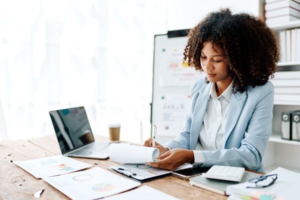 Woman working at computer.