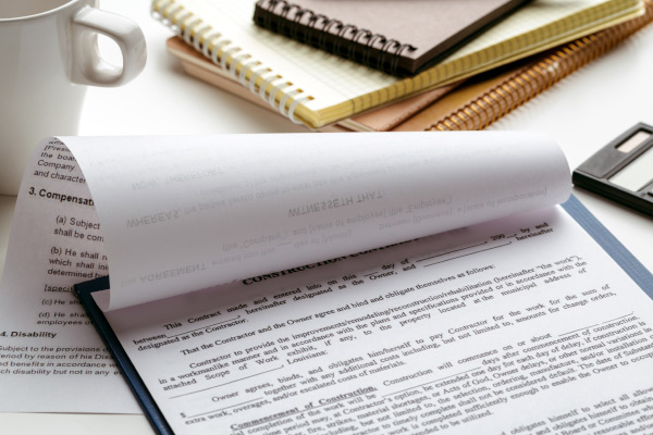  Contract on a clipboard.